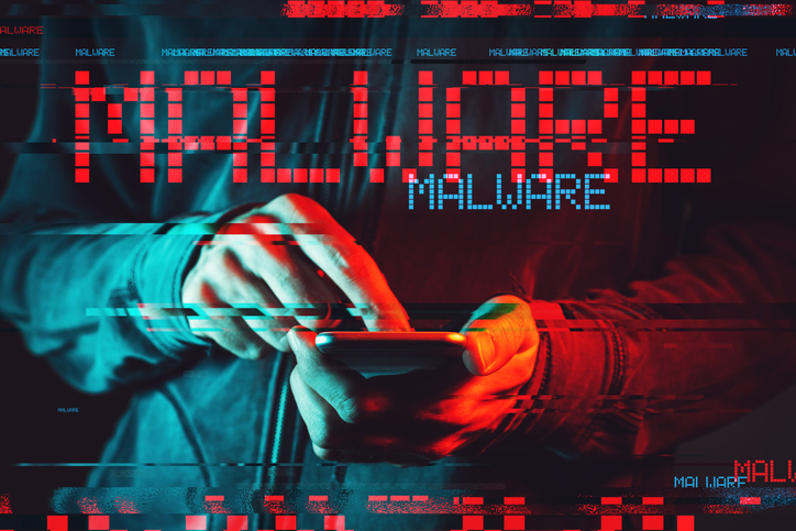 Malware concept with male person using smartphone, low key red and blue lit image and digital glitch effect